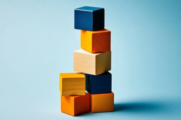 Naklejka premium Promote creativity and stability with constructed wooden tower blocks for children.