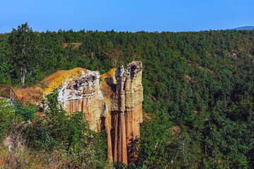 Fototapeta premium Pha Singh Leaw the wonder landscape of attractions natural phenomenon in Chiang Mai,Thailand. Canyon and green forest in nature. The sand stone mountain or canyon natural phenomenon cliff and pillars.