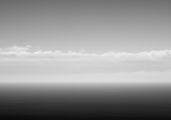 Obraz premium minimalist landscape, foggy horizon, white and gray tones, ethereal atmosphere, empty expanse, soft light, dreamy skyscape, abstract nature, misty plains
