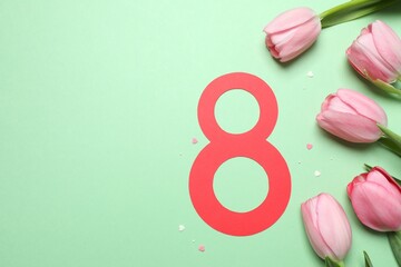 March 8 greeting card design with tulip flowers, top view. Happy International Women's Day