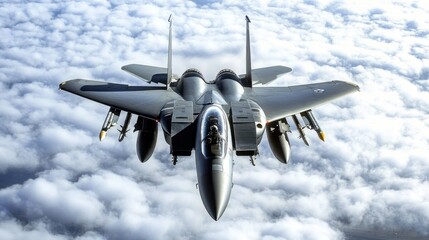 F-15 Eagle soars against a backdrop of fluffy clouds, ascending high