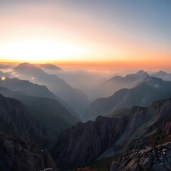 Fototapeta premium The image features a panoramic view of high mountains with their peaks shrouded in a thin mist during sunrise. The golden morning light beautifully illuminates the valley below, creating a stunning bl