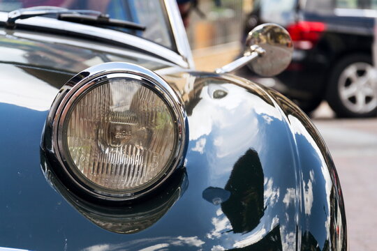 SAALBACH-HINTERGLEMM, AUSTRIA - JUNE 21 2018: Vintage car Austin Healey Sprite roadster oldsmobile veteran produced from 1958 to 1971 stands on June 21, 2018 in Saalbach-Hinterglemm, Austria.