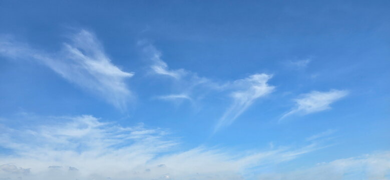  Sky Blue and white cloud, Thin clouds floating.  Clear blue sky with some clouds.Elegant empty blue background.  Horizon Spring, Clear Sky. Sky is very bright and the sun is shining. Beauty of nature