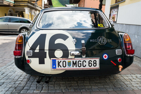 SAALBACH-HINTERGLEMM, AUSTRIA - JUNE 21 2018: Vintage car MG MGC GT coupe oldsmobile veteran stands on June 21, 2018 in Saalbach-Hinterglemm, Austria.