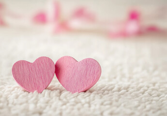 Elegant pink wooden hearts on soft carpet against a minimal white background with subtle "38 Women's Day" accents and warm feminine light