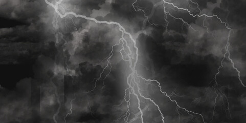 Thunder, lightnings and rain on a stormy summer night in black and white. Lightning bolts in the sky at night. 

