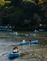 Arashiyama district panorama in western Kyoto, Japan, with boats and mountain Arashi, Togetsukyo bridge, Katsura Hozu River, autumn fall landscape view, travel to Japan, Kansai region, Kyoto