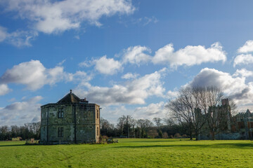 Fototapeta premium the conduit house the round tower or water tower of cowdray house Midhurst West Sussex England