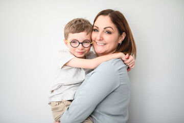 Mother and child son over white background
