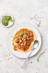 Seitan and Tomato Stroganoff with Herb Pesto and Creamed Polenta