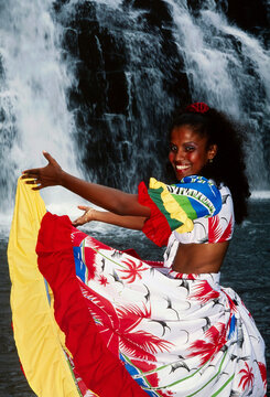 Tropical woman dancer with traditional sega dress posing in nature of Mauritius island.