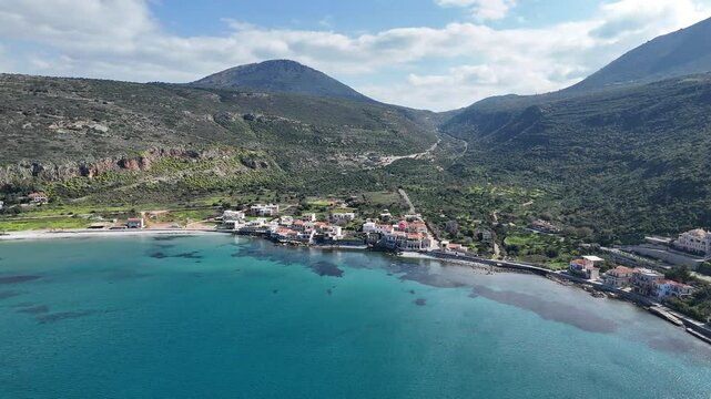 Aerial view of the coast and village of Neo Itylo with mountains in the background. Located in Mani, Laconia, Greece