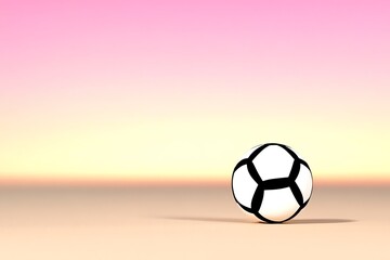 Fototapeta premium A lone soccer ball rests on a smooth surface under a gradient sky transitioning from pink to yellow.