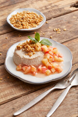 Semolina Pudding with Peach Sauce 