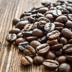 Naklejka premium Black Coffee Grains on a Brown Wooden Table: A Rustic Background Image