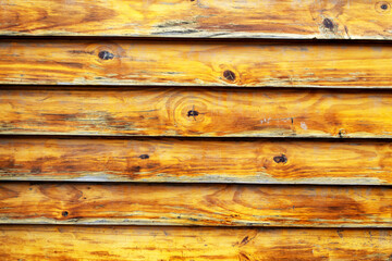 Wooden wall in natural color, the boards are horizontal