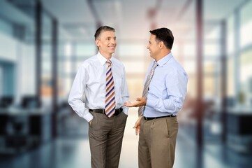 Two corporate worker professionals in a conversation