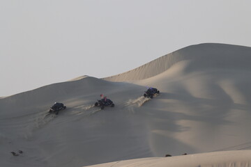 Off-road with buggy on dunes