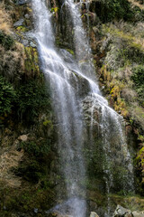 View of a beautiful waterfall in a mountain valley, Close waterfall rocks, Water show supported by rocks, Mountain waterfall, waterfall in the forest, Swat, KPK Province, Pakistan 
