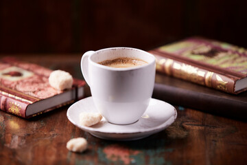Cup of coffee on wooden background. Soft focus. Copy space	