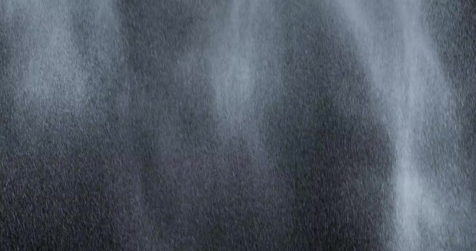 4k Rain over black background, realistic rain can be use in your composition, Rain hits the ground effect, Splashing rain