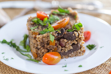 cooked bulgur with mushrooms and vegetables