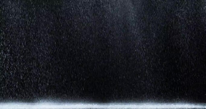4k Rain over black background, realistic rain can be use in your composition, Rain hits the ground effect, Splashing rain