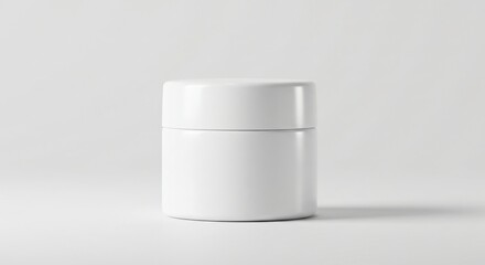White cosmetic jar with a minimalistic design placed on a plain white background for branding or product packaging.