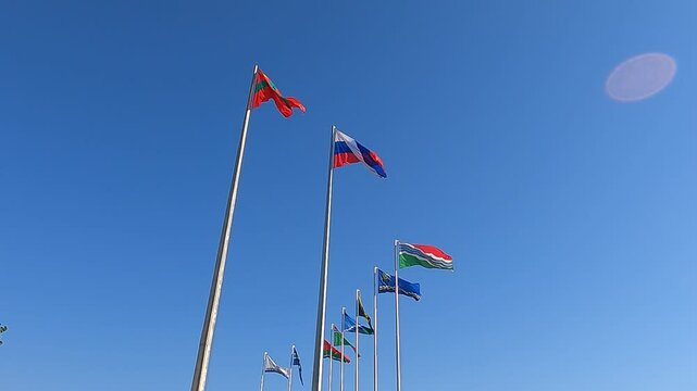 Russian and Transnistrian flags waving in the wind in Tiraspol