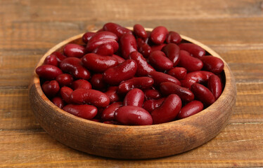 bowl of red beans on wooden background