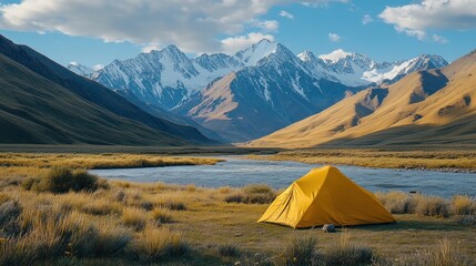 Camping tent by river, with snowy peaks background. Possible use Outdoor adventure