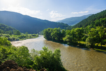 Beautiful landmark near the Borjomi with Kura river and mountain forest. © vahanabrahamyan