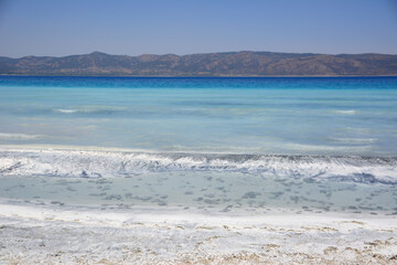 a Landscape with blue water and mountains