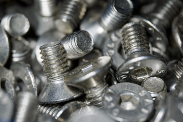 Detail of shiny metal screws.
