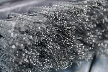 Manual fine stainless steel brush.
