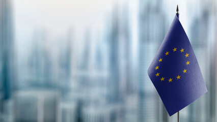 Small national flag of the European Union on a black background