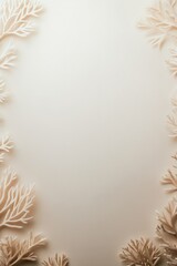 Delicate coral-like patterns frame soft, neutral background invi