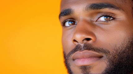 Obraz premium Portrait of an intriguing african american man in a vibrant setting