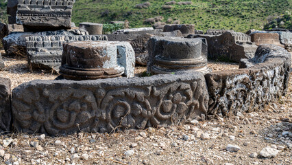 Variety of carved architectural features from the ruins at Sussita (Hippos) National Park on the...