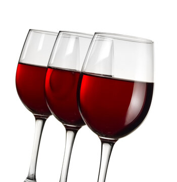 Three red wine glasses, close up on white background, studio shot