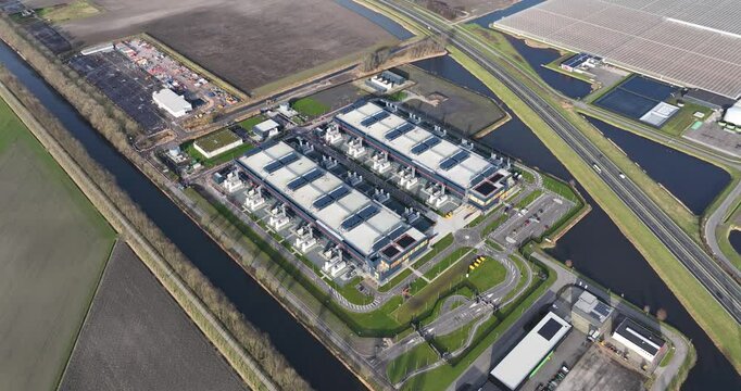 Hyperscaler, data center, global computing, massive workloads, infrastructure for modern cloud computing. Aerial drone view.