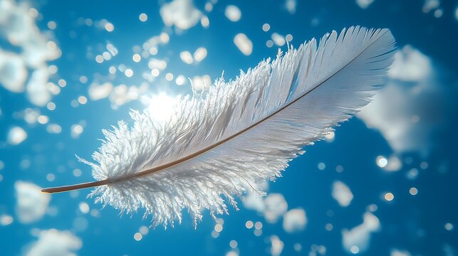 Soft feather appearing weightless in a vast blue sky setting