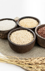 different kinds of asian rice variety grains in rustic setting display in Cambodia