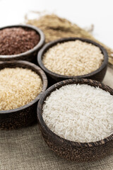 different kinds of asian rice variety grains in rustic setting display in Cambodia