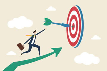 Business target achievement or success and reaching for target and goal concept, businessman leader holding dart running from rising graph arrow and jump to bullseye target to win in business strategy