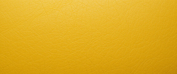 Yellow leather texture background with detailed grain high-quality design element close-up view