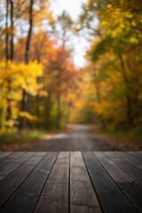 Wooden floor with blur autumn forest background