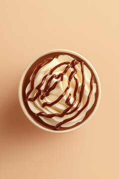 Creamy dessert topped with chocolate drizzle, showcasing an enti