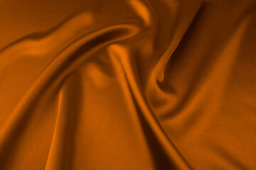 Brown satin or silk fabric as background